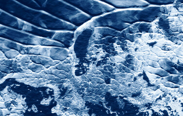 blue ice desert in arctic type ice field background © Imagination