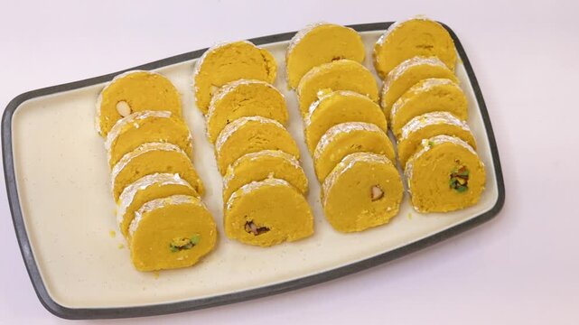 Patissa patisa sweet served on a white plate