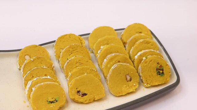 Patissa patisa sweet served on a white plate