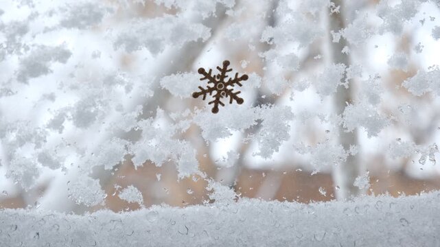 Frosty window, dreamy, coziness and tranquility. Atmosphere is calm and quiet, reflecting the peaceful stillness after a snowstorm. Frosty glass, fluffy snow, post-blizzard,  quiet winter,