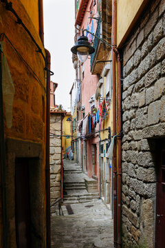 Narrow historic alley with colorful houses in Porto, Portugal