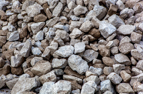 A pile of concrete stones and rubble from pavement