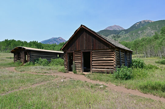Long abandoned buildings of Ashcroft Ghost Town in Castle Creek Valley near Aspen, Colorado on sunny summer morning.