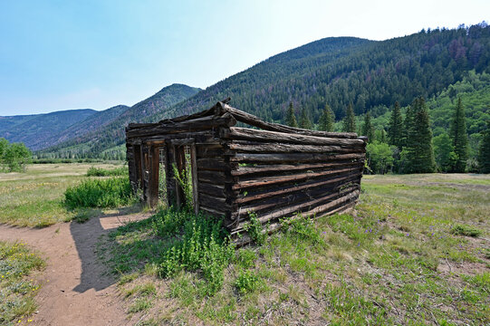 Long abandoned buildings of Ashcroft Ghost Town in Castle Creek Valley near Aspen, Colorado on sunny summer morning.