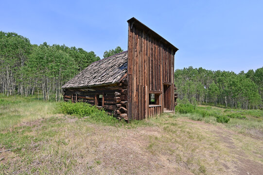Long abandoned buildings of Ashcroft Ghost Town in Castle Creek Valley near Aspen, Colorado on sunny summer morning.
