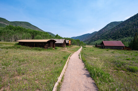 Long abandoned buildings of Ashcroft Ghost Town in Castle Creek Valley near Aspen, Colorado on sunny summer morning.