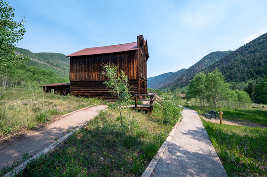 Long abandoned buildings of Ashcroft Ghost Town in Castle Creek Valley near Aspen, Colorado on sunny summer morning.