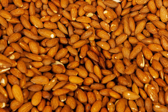 Top view of almond nuts close-up for marketplace advertising