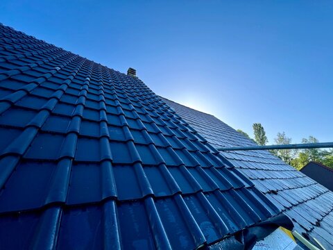 Roof repair installation of tiles construction work
