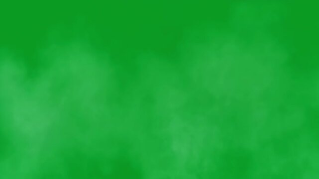 Seamless loop of white smoke and fog drifting across a green screen chroma key background