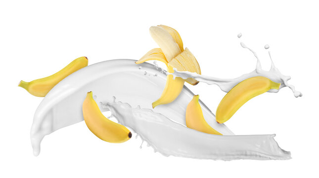Milk splash and bananas in air against white background