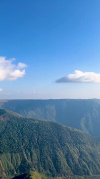 Panoramic Laitlum scenic view, lush green mountain valley. Forested hills, white fluffy clouds. Travel tourism Himachal, Himalayas ecotourism outdoor adventure nature, meghalaya 