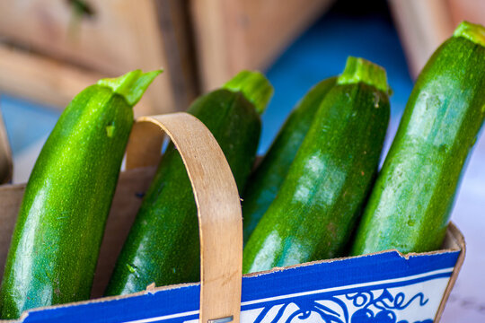 Whole fresh cucumbers in market fresh basket