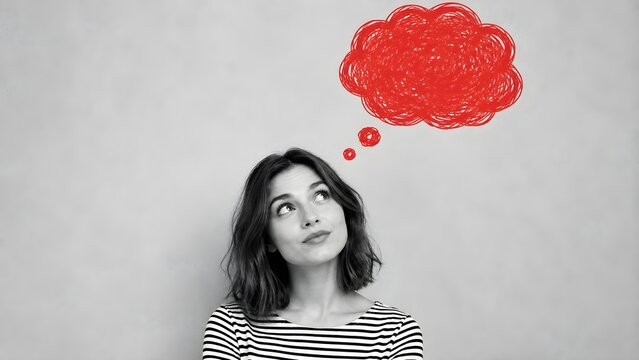 Thoughtful woman looking upward with red thought bubble above her head representing ideas, imagination, decision making, creativity, and personal reflection
