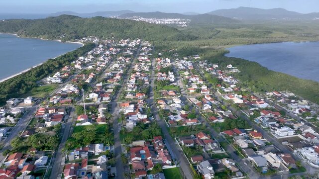 Florian&oacute;polis, Daniela Beach. Aerial View of Tropical Coastline. Establishing Shot. Santa Catarina, Brazil.