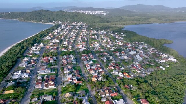 Florian&oacute;polis, Daniela Beach. Aerial View of Tropical Coastline. Establishing Shot. Santa Catarina, Brazil.