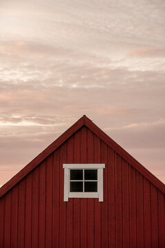 red scandi wooden cabin in Norway