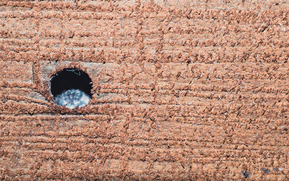 Macro of corrugated cardboard texture with round hole