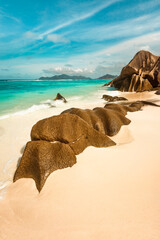 Weathered granite boulders on white sand beach at Anse Source d'Argent, La Digue, Seychelles © Maurizio De Mattei