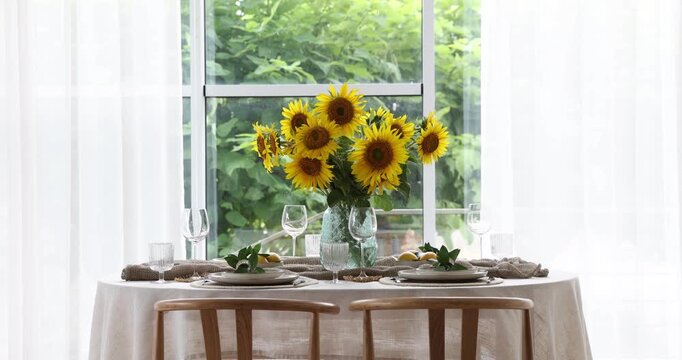 Beautiful place setting with floral decor on table indoors