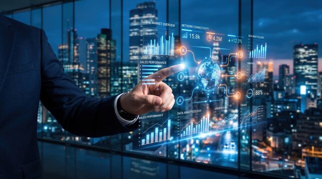 Businessman touching futuristic hologram interface displaying global market overview, network connectivity, and sales performance charts against modern city skyline at night