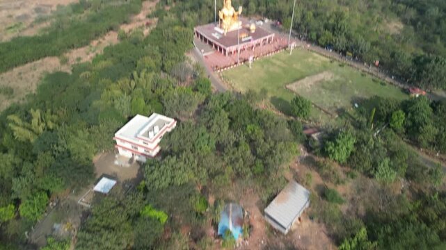 Majestic golden statue of Hindu God Hanuman at Pitreshwar Dham