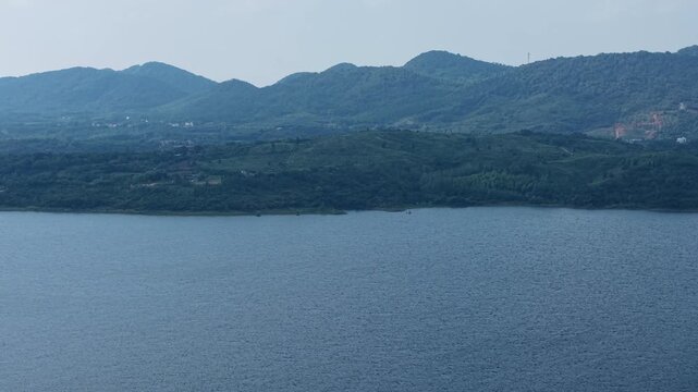 Aerial View of Huiting Reservoir and Distant Mountains, Jingshan, Hubei, China