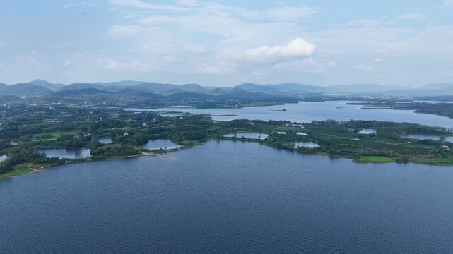 Aerial View of Huiting Reservoir and Distant Mountains, Jingshan, Hubei, China