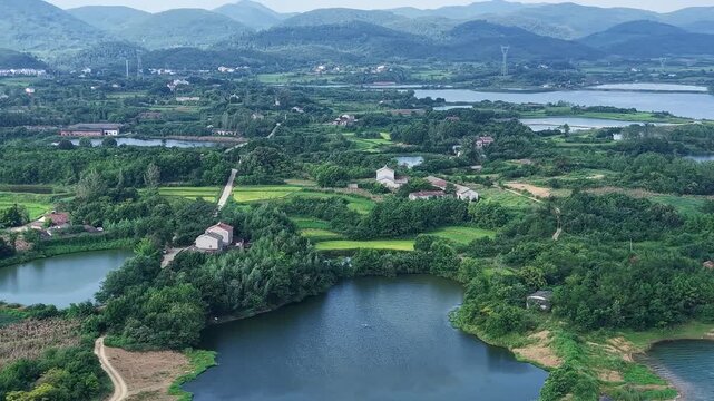 Aerial View of Huiting Reservoir and Distant Mountains, Jingshan, Hubei, China
