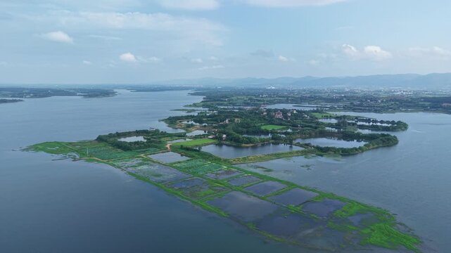 Aerial View of Huiting Reservoir and Distant Mountains, Jingshan, Hubei, China