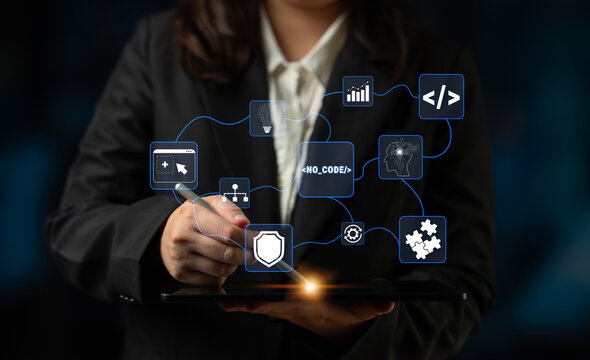 Business professional in a suit using a tablet with digital interface icons for technology, management, data analysis, and innovation in a modern work environment Quark.