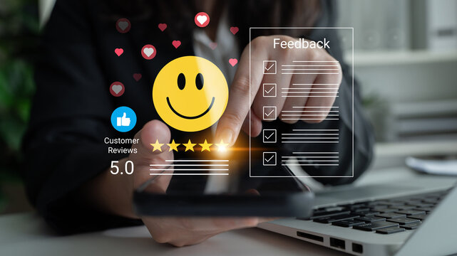 A customer shares positive feedback through a smartphone in a modern office setting, highlighting the importance of ratings and customer reviews for business success. Cyphers