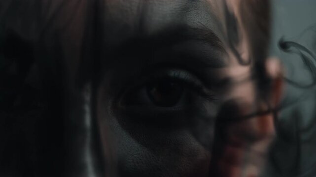 Artistic Close-up of Brown Eye with Black Lace Pattern Shadow for Beauty and Mystery Concept
