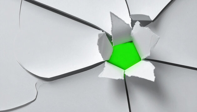 Torn paper revealing green background