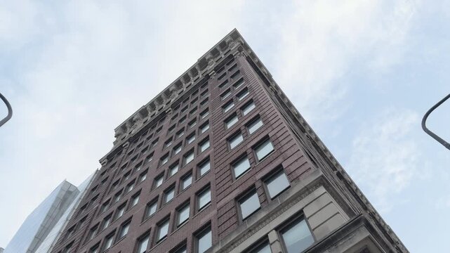 Looking up at tall buildings in city establishing 4k
