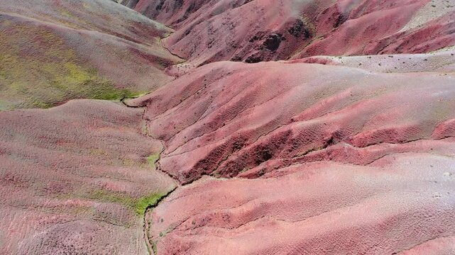 Red clay canyon. Aerial video from drone of Altai mountain landscape. Camera looks down.