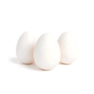 Three white chicken eggs isolated on white background