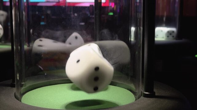 Bubble craps dice bouncing in chamber at casino 4k
