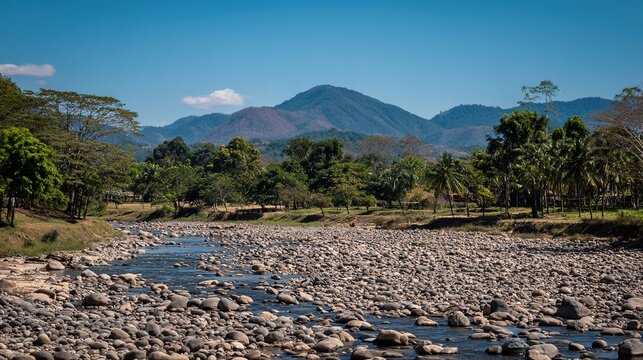 silt. Dry riverbed refilled with clear flowing water, sunlight glinting on surface. ESG reports, sustainability campaigns, designed for environmental awareness campaigns, used by PR specialists.