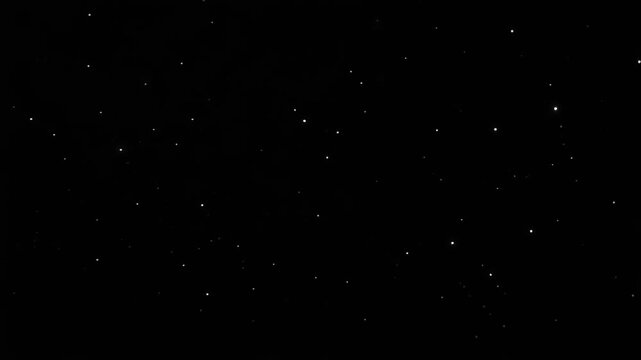 Starry night sky with numerous small bright stars scattered across black space