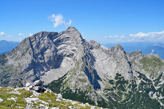 Rocky mountain peak Hochtor rising under blue sky in summer. Ges&auml;use National Park, Styria, Austria