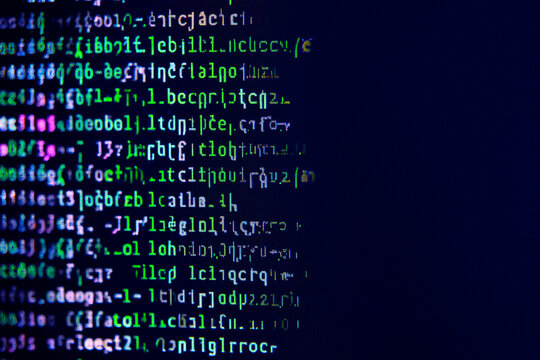programming code on a screen and glitch effect