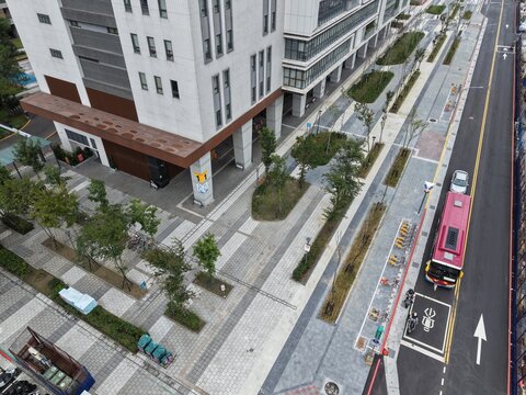 Top down view of modern administrative building plaza and city street.