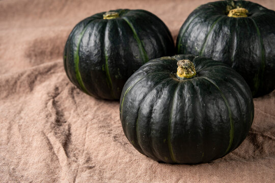 Green mini pumpkins, fresh harvest of small green pumpkins