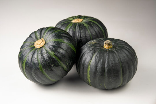 Green mini pumpkins, fresh harvest of small green pumpkins