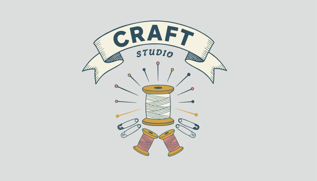 Craft Studio logo design featuring sewing thread spools, safety pins, and hand sewing needles under a ribbon banner.