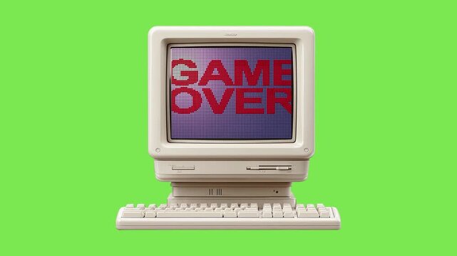 Classic desktop computer featuring a vibrant 'Game Over' display, a nostalgic symbol of bygone digital adventures and retro gaming culture