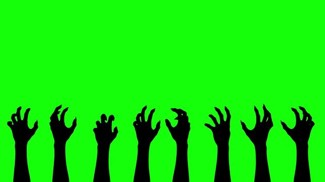 Scary zombie hands reaching on a green screen background,chroma key
