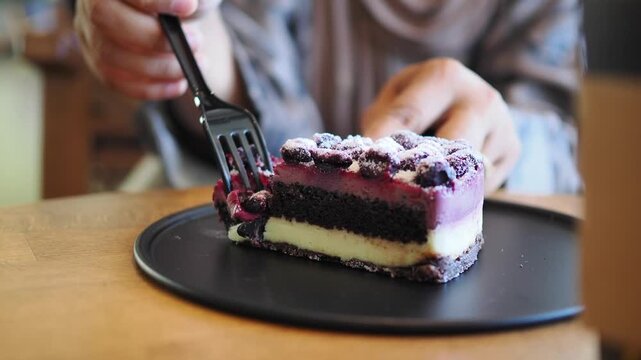 Enjoying dessert with a delicious cake slice