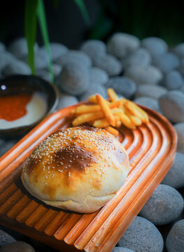 Traditional Turkish cuisine, pide stuffed with minced meat. Middle Eastern snack cuisine on a clay plate, cooked meat pie, cheese pastry pie
